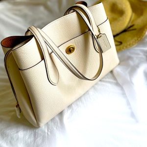 COACH-The Lora Carryall. Brand New